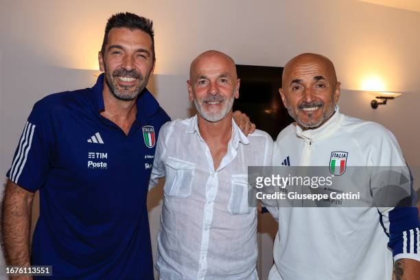 Head of Italy Delegation Gianluigi Buffon, Stefano Pioli Head coach of AC Milan and Head coach of Italy Luciano Spalletti pose prior to the AC Milan...
