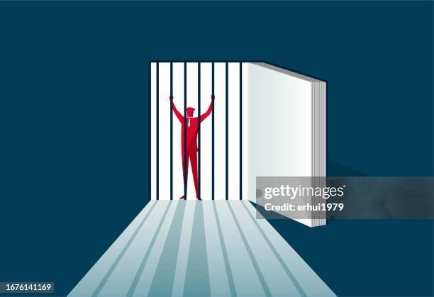 the man imprisoned in the book - closing book stock illustrations