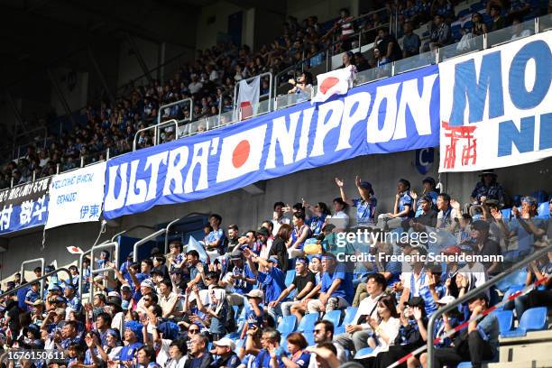 Fans of Japan celebrates his teams fourth goal during the international friendly between Japan and Turkey at Cegeka Arena on September 12, 2023 in...