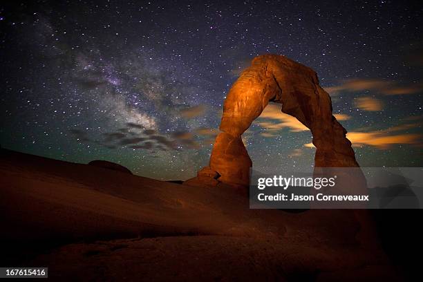 the iconography of time - arches national park stockfoto's en -beelden