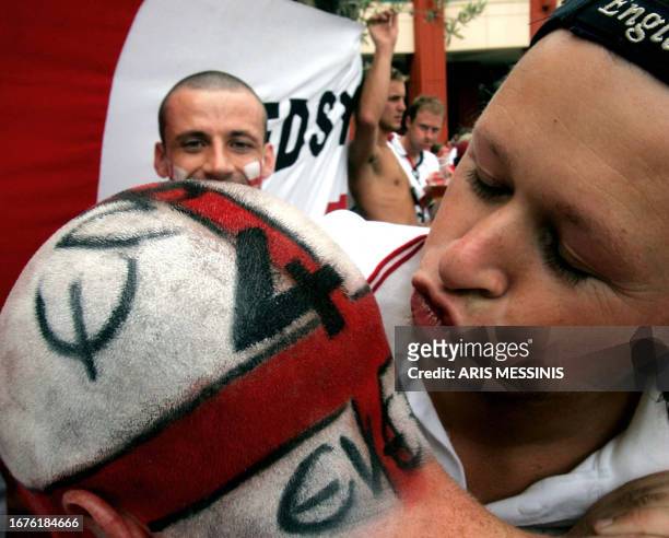 British supporters have fun outside Lisbon's Da Luz stadium prior to the Euro 2004 match England vs Portugal 24 June 2004. AFP PHOTO / Aris Messinis