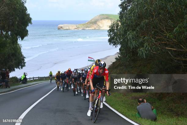 Robert Gesink of The Netherlands, Dylan Van Baarle of The Netherlands and Wilco Kelderman of The Netherlands and Team Jumbo-Visma lead the peloton...