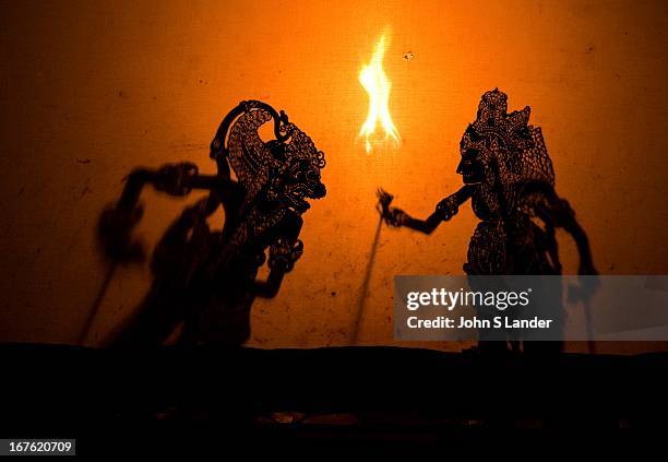 Wayang kulit or shadow puppet theater - Performances of shadow puppet theater are accompanied by gamelan in Indonesia. Shadow puppets are a play of...