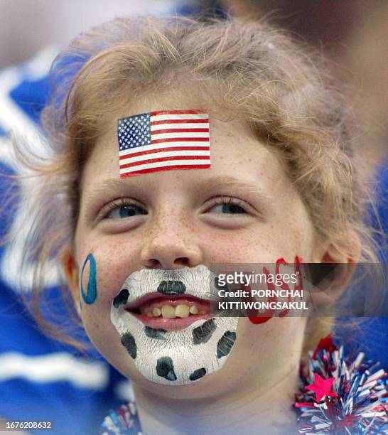 Young USA support smiles ahead of the Poland-USA Group D match at the 2002 FIFA World Cup Korea/Japan in Daejeon, 14 June 2002. It is the third...
