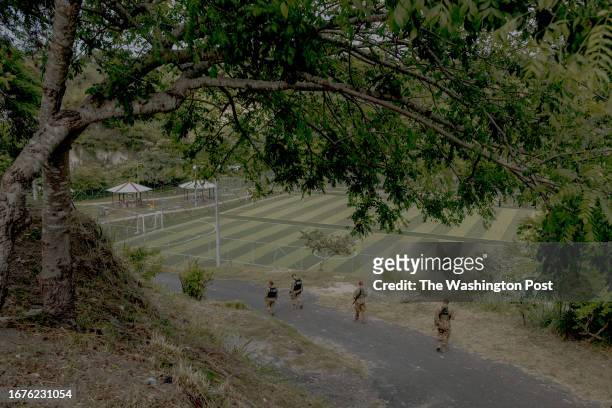 Soldiers patrol La Campanera neighborhood in the province of Soyapango on July 26, 2023. For decades La Campanera neighborhood was controlled by the...