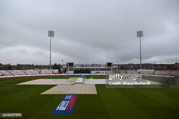 Rain stops play and the covers come on during the 2nd Metro Bank ODI between England Women and Sri Lanka Women at The County Ground on September 12,...