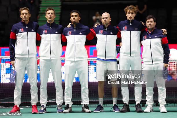 Nicolas Mahut, Edouard Roger-Vasselin, Arthur Fils, Adrian Mannarino, Ugo Humbert and Sebastian Grosjean of Team France line up during the Opening...