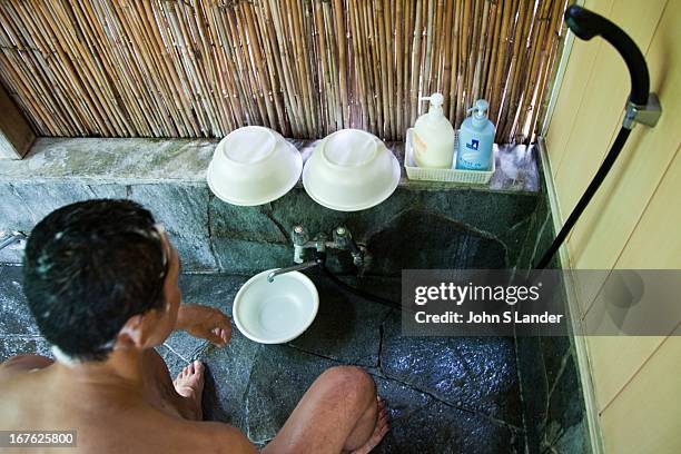 At an onsen, as at a sento or public bath, all guests are expected to wash their bodies and rinse themselves thoroughly before entering the hot...