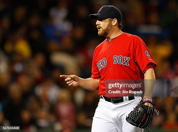 Ryan Dempster of the Boston Red Sox reacts in the 6th inning against the Houston Astros at Fenway Park on April 26, 2013 in Boston, Massachusetts.