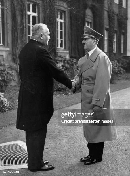 Adolf Hitler appoints Konstantin von Neurath to Reichsprotektor of occupied Bohemia and Moravia. Prague. Photograph. 1939. Adolf Hitler ernennt...