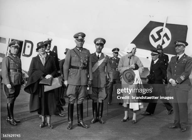 War Minister Field Marshal Werner von Blomberg at the airport before leaving for Rome. To his right: the Italian military attaché in Berlin, Colonel...