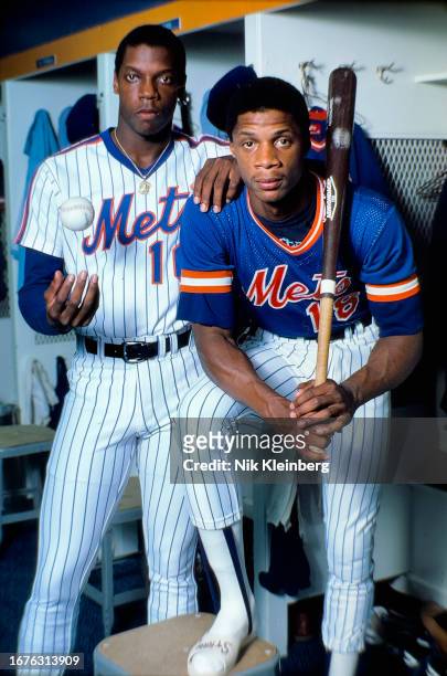 Portrait of American baseball players Dwight Gooden and Darryl Strawberry, both of the New York Mets, as they pose in the Mets' clubhouse at Shea...