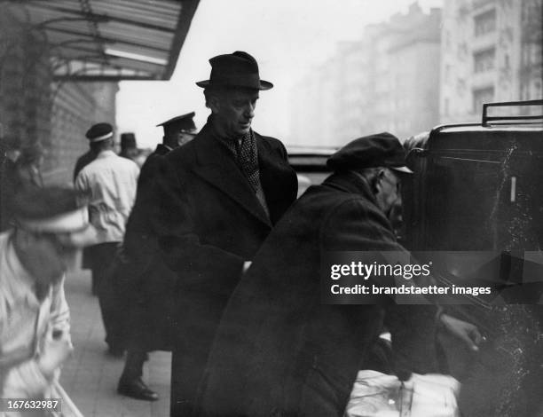 Wilhelm Furtwaengler at his arrival at the Viennese Franz-Josef railway station. The conductor came to see the rehearsals of "Meistersinger von...