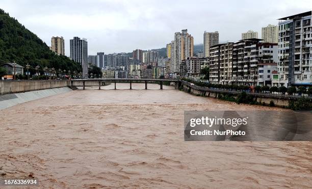 Flood waters rise in the Tongjiang River basin in Tongjiang County, Bazhong City, Sichuan province, China, September 19, 2023.