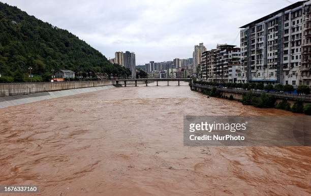 Flood waters rise in the Tongjiang River basin in Tongjiang County, Bazhong City, Sichuan province, China, September 19, 2023.