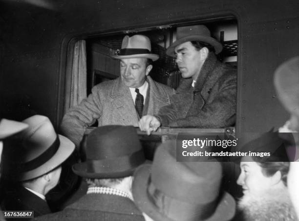 German boxer Max Schmeling and his coach Machon depart from Berlin Zoologischer Garten station to the United Staes of America. Berlin. Germany....