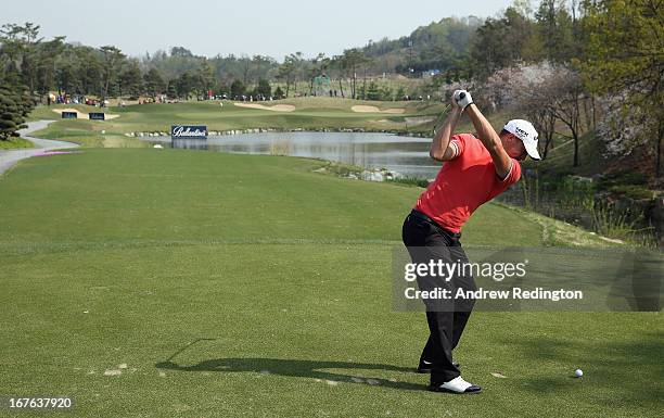 Alexander Noren of Sweden hits his tee-shot on the seventh hole during the third round of the Ballantine's Championship at Blackstone Golf Club on...