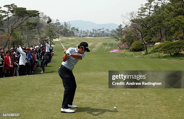 Kim of Korea hits his tee-shot on the tenth hole during the third round of the Ballantine's Championship at Blackstone Golf Club on April 27, 2013 in...