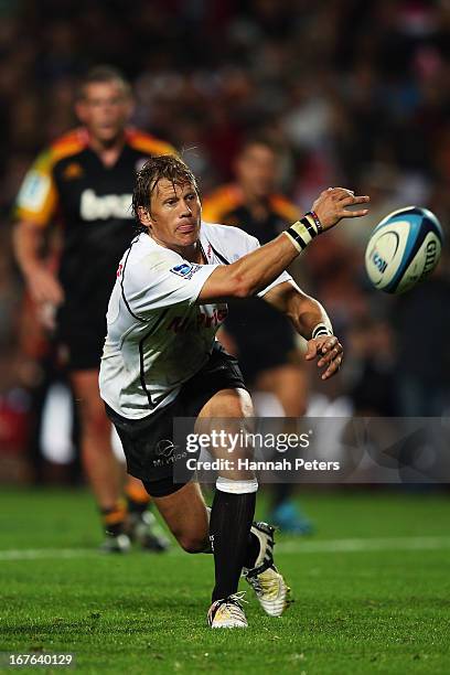 Charl McLeod of the Sharks passes the ball out during the round 11 Super Rugby match between the Chiefs and the Sharks at Waikato Stadium on April...