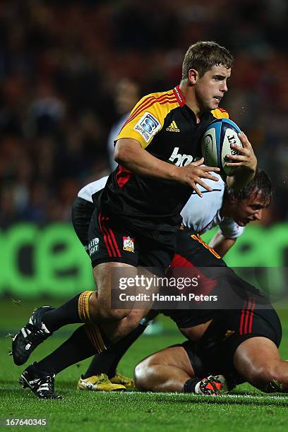 Rhys Marshall of the Chiefs makes a break during the round 11 Super Rugby match between the Chiefs and the Sharks at Waikato Stadium on April 27,...