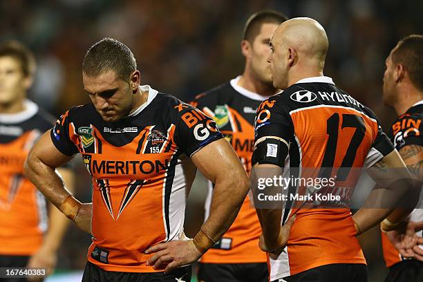 Robbie Farah of Tigers looks dejected after a Broncos try during the round seven NRL match between the Wests Tigers and the Brisbane Broncos at...