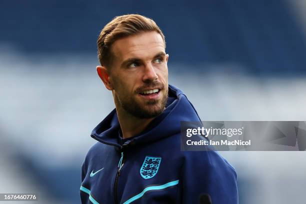 Jordan Henderson of England looks on as he inspects the pitch prior to the 150th Anniversary Heritage Match between Scotland and England at Hampden...