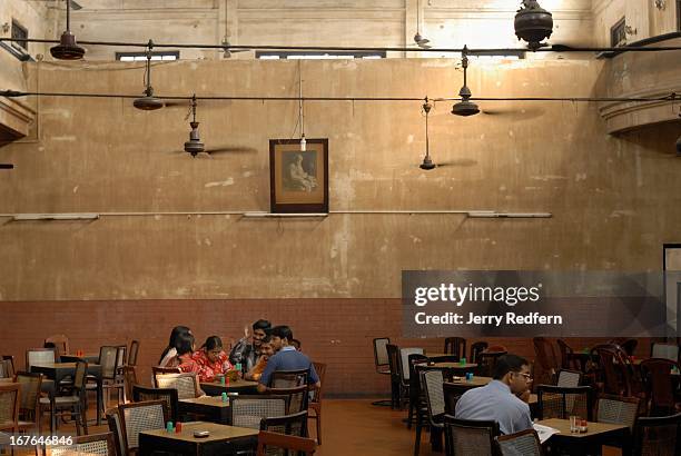 Interior view of the Indian Coffee House, a historic meeting place of intellectuals and writers from Kolkata's past and present. Students from the...