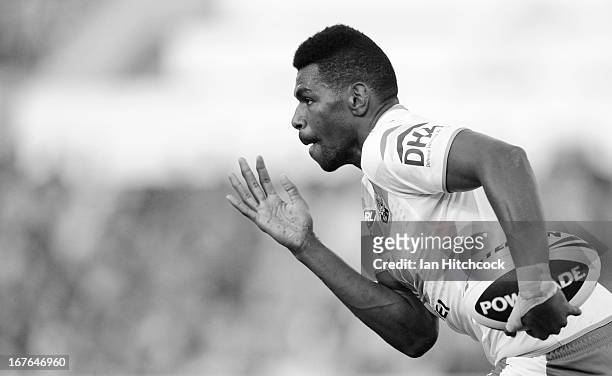Edrick Lee of the Raiders makes a break which led to him scoring a try during the round seven NRL match between the North Queensland Cowboys and the...
