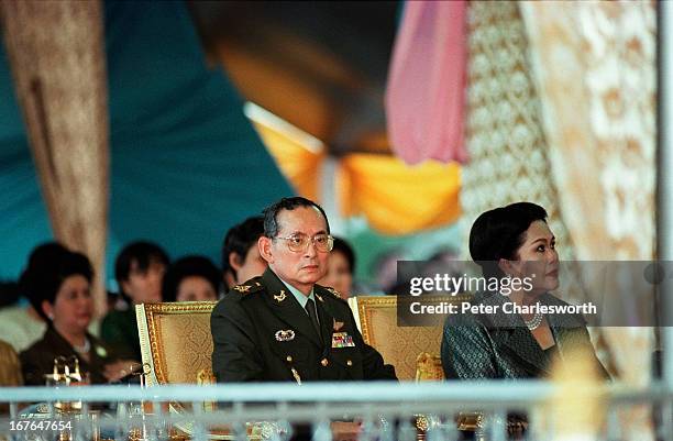 His Majesty, King Bhumibol Adulyadej of Thailand, and Queen Sirikit at the opening ceremony of the Pa Sak Jolasid Dam, a massive irrigation...