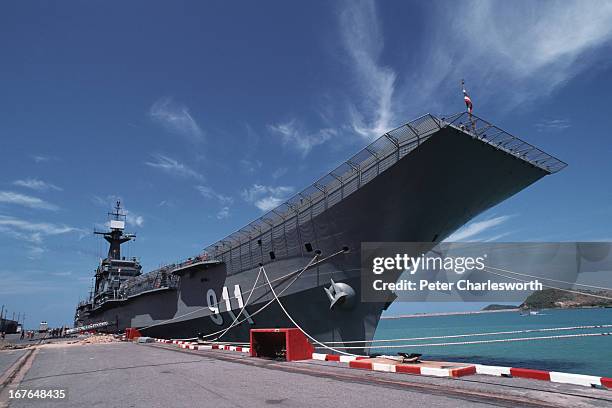 Thai tourists visit the Royal Thai Navy's HTMS Chakri Naruebet at its berth at the Sattahip navy docks. This small Spanish-built aircraft carrier...