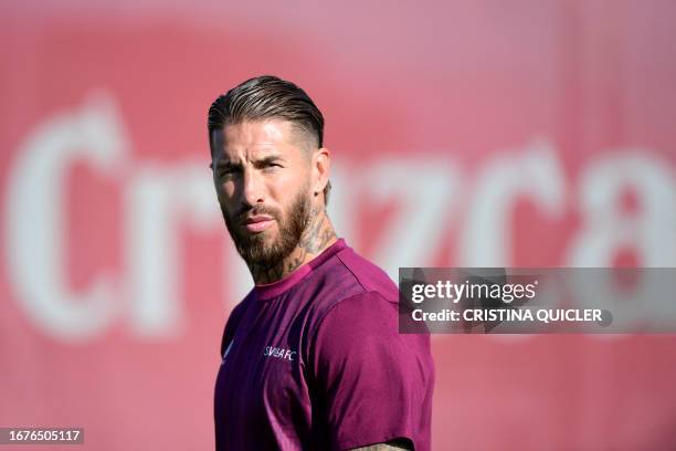 Sevilla's Spanish defender Sergio Ramos attends a training session on the eve of the UEFA Champions League football match between Sevilla FC and RC...