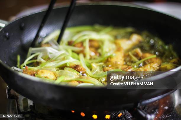 fried hemibagrus fish in hanoi, vietnam - fried catfish stock pictures, royalty-free photos & images