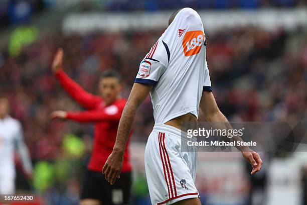 Darren Pratley of Bolton Wanderers covers his head with his shirt after missing a goalscoring opportunity during the npower Championship match...