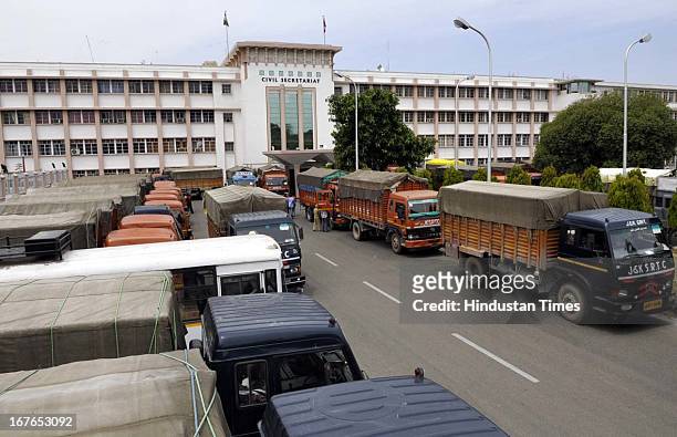 Official documents loaded buses and trucks standing at Civil Secretariat during the bi-annual darbar move from Jammu to Srinagar, on April 27, 2013...
