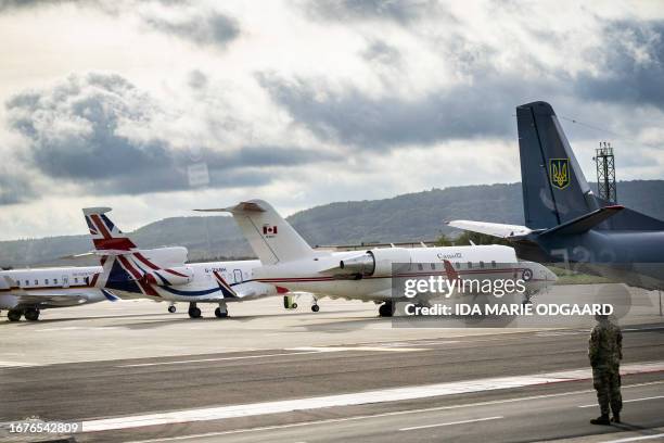 Delegation planes from Ukraine, Canada, Great Britain and Germany stand on the runway at Ramstein Air Base, southwestern Germany, during an in-person...