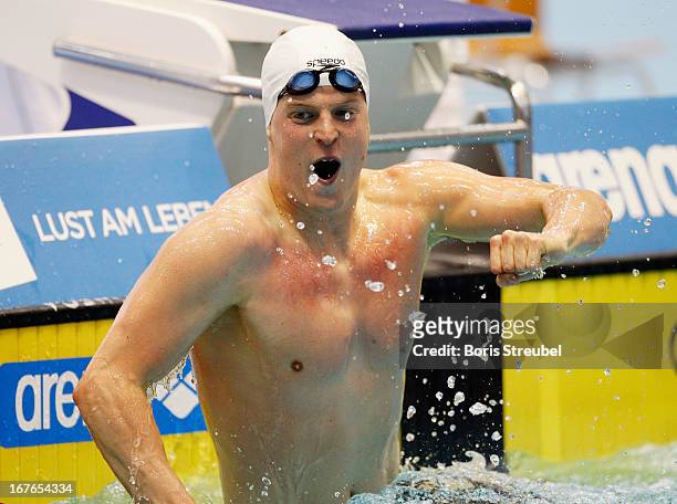 Steffen Deibler of Hamburger SC celebrates after winning the men's 100m freestyle A final during day two of the German Swimming Championship 2013 at...
