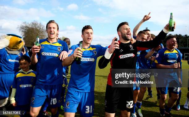 Wimbledon players celebrate after the final whistle during the npower League Two match between AFC Wimbledon and Fleetwood Town at the Cherry Red...