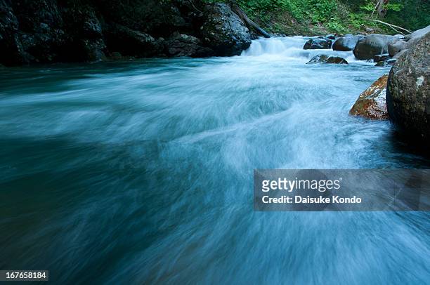 usubetsu river - flowing river stock pictures, royalty-free photos & images