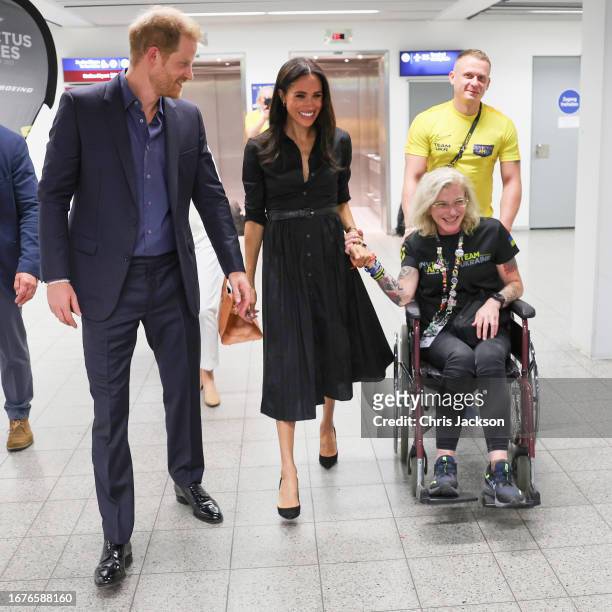 Prince Harry, Duke of Sussex, Meghan, Duchess of Sussex and Yuliia “Taira” Paievska are seen at the “Friends @ Home Event” at the Station Airport...