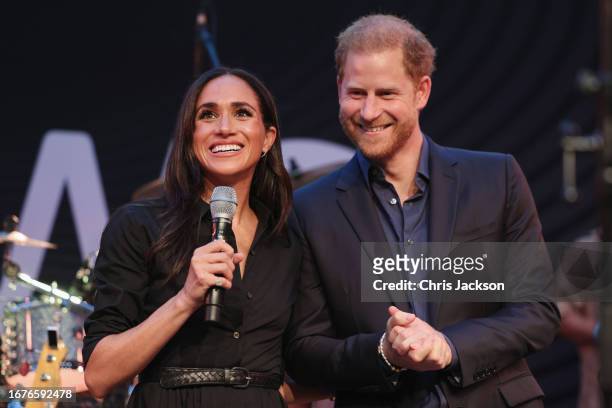 Prince Harry, Duke of Sussex and Meghan, Duchess of Sussex speak on stage at the "Friends @ Home Event" at the Station Airport during day three of...