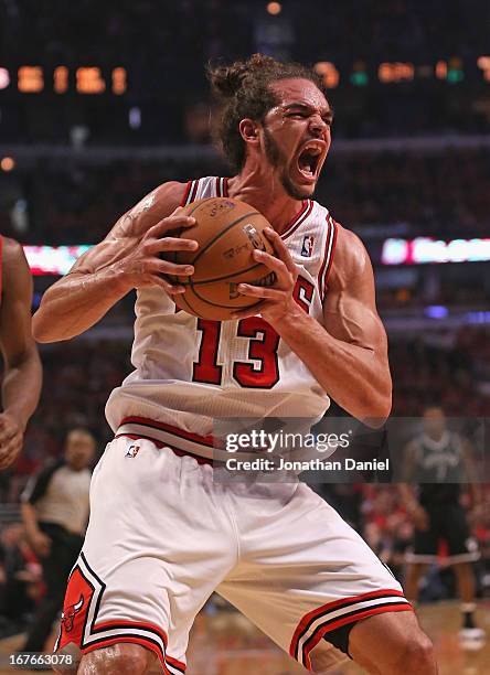 Joakim Noah of the Chicago Bulls reacts after chasing down a loose ball against the Brooklyn Nets in Game Five of the Eastern Conference...