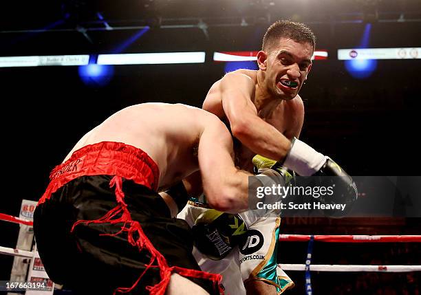 Haroon Khan in action against Brett Fidoe during their Bantamweight bout at Motorpoint Arena on April 27, 2013 in Sheffield, England.