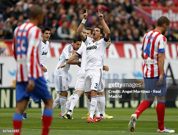 Pepe of Real Madrid celebrates their equalising goal during the La Liga match between Atletico de Madrid and Real Madrid at Vicente Calderon Stadium...