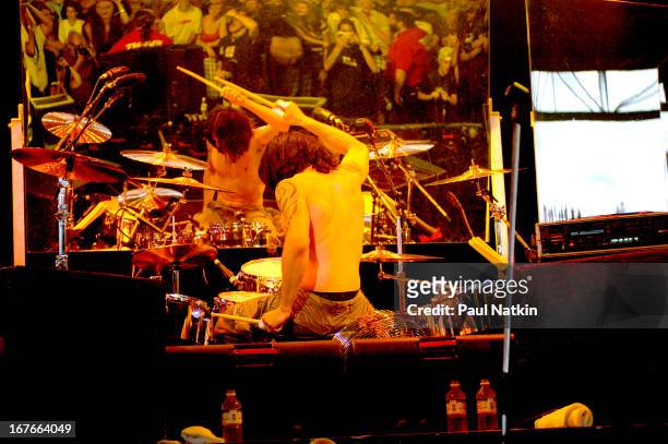 American rock band Audioslave performs on stage, Milwaukee, Wisconsin, July 11, 2003. Pictured is drummer Brad Wilk.