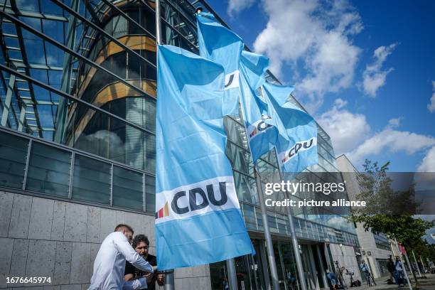 Cdu Labels The new CDU logo can be seen on flags in front of the Konrad Adenauer ...