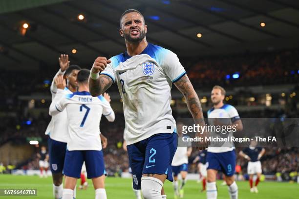 Kyle Walker of England celebrates his team's first goal, scored by Phil Foden, during the 150th Anniversary Heritage Match between Scotland and...