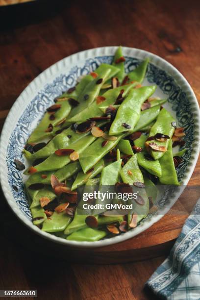 roasted green beans with almond bacon - green bean dish stock pictures, royalty-free photos & images