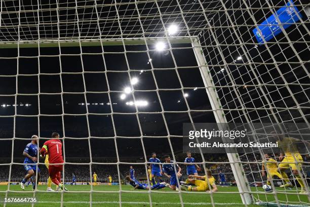 Andriy Yarmolenko of Ukraine scores the 2-1 goal during the UEFA EURO 2024 European qualifier match between Italy and Ukraine at Stadio San Siro on...