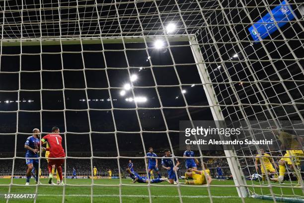 Andriy Yarmolenko of Ukraine scores the 2-1 goal during the UEFA EURO 2024 European qualifier match between Italy and Ukraine at Stadio San Siro on...