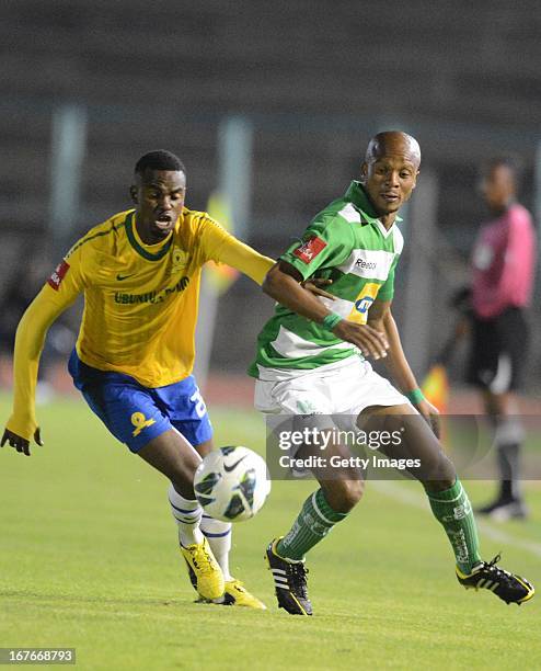 Jabulani Shongwe of Sundowns and Itumeleng Duiker of Celtic compete for the ball during the Absa Premiership match between Mamelodi Sundowns and...